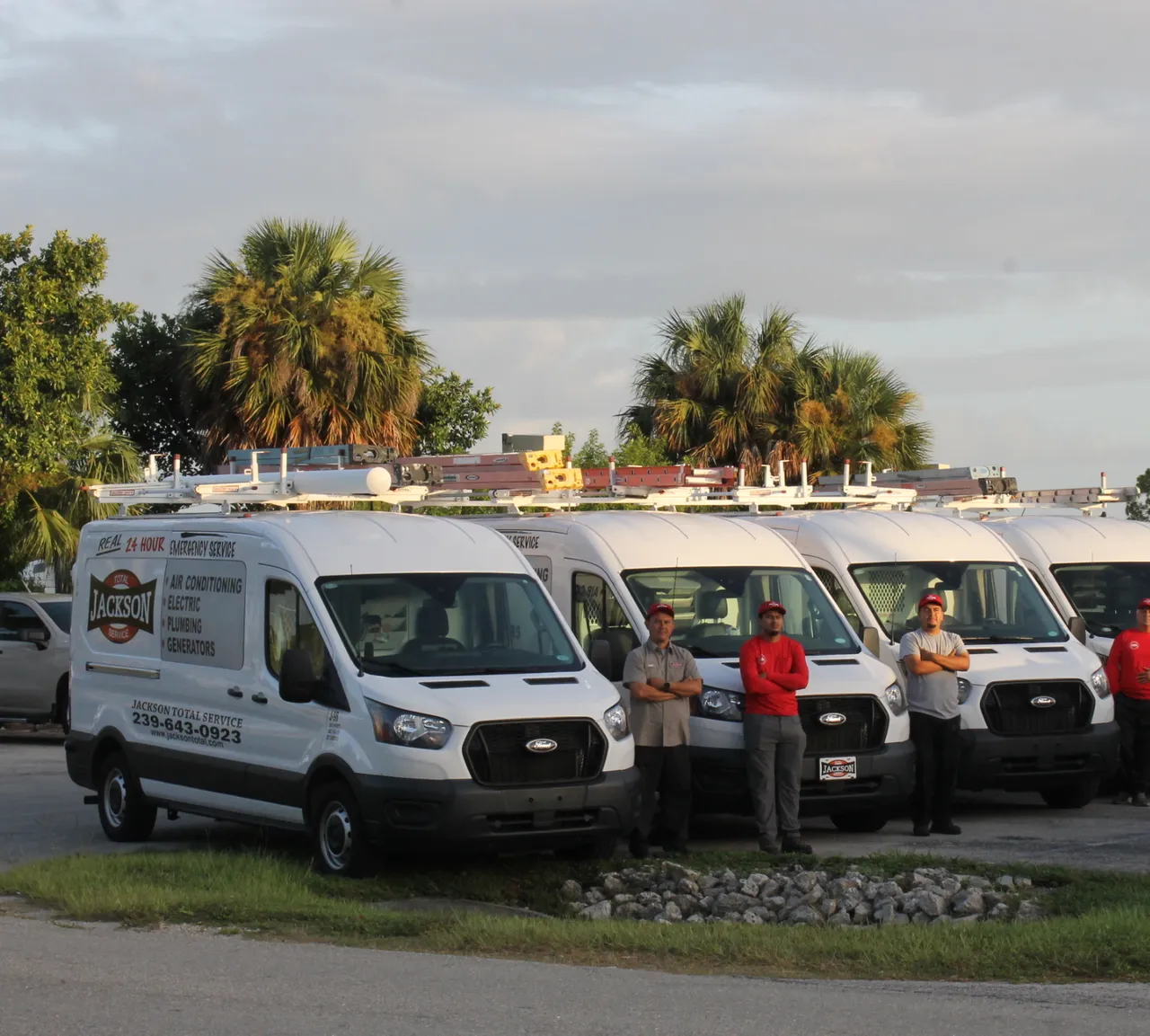 Jackson Total Service crew with the fleet in the early morning sun